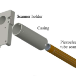 Atomic force microscopy with a 12-electrode piezoelectric tube scanner